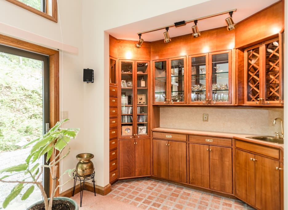 Bar with sink in family room.