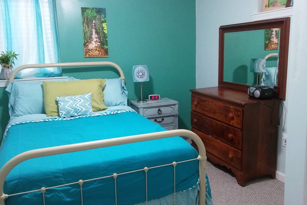 Full-sized bed in bedroom