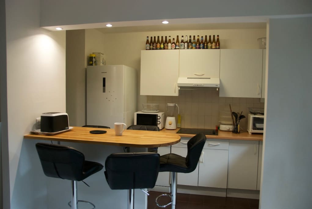 kitchen with bar and all amenities