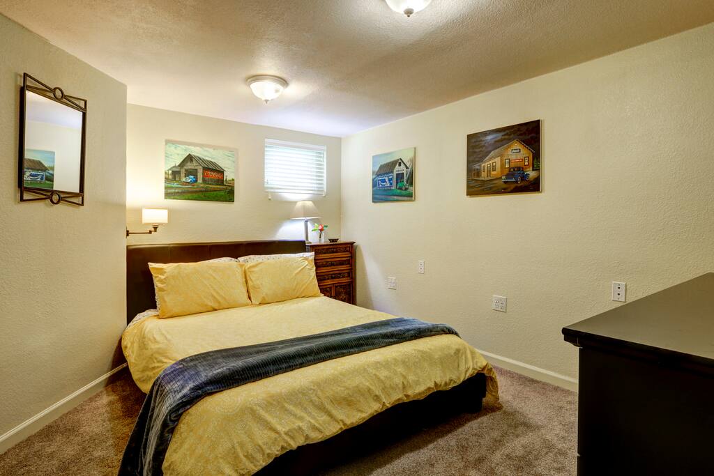 You'll love snuggling into this luxurious low platform bed after long days exploring Denver's delights!