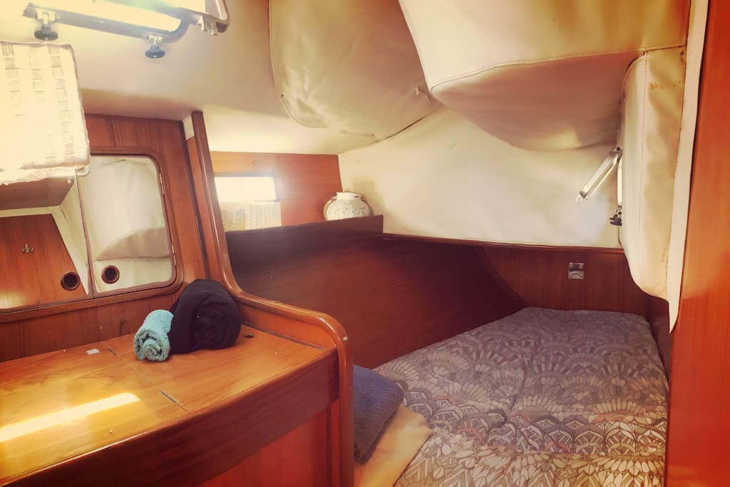 This is your bow cabin with three little windows. Lots of light!
