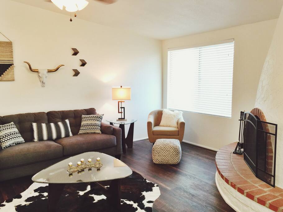 Living room with wood burning fireplace