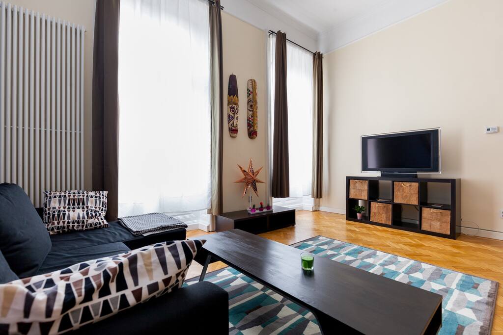 Living room sofa by big TV