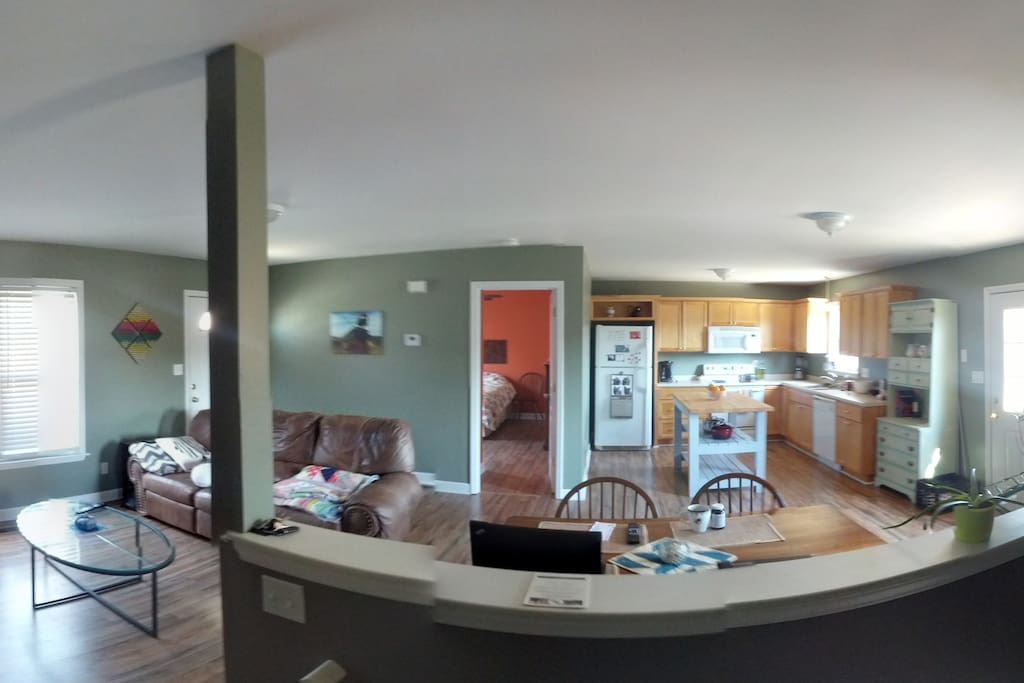 A view of upstairs. Master bedroom door in center, door to top deck on right, main entrance on left.