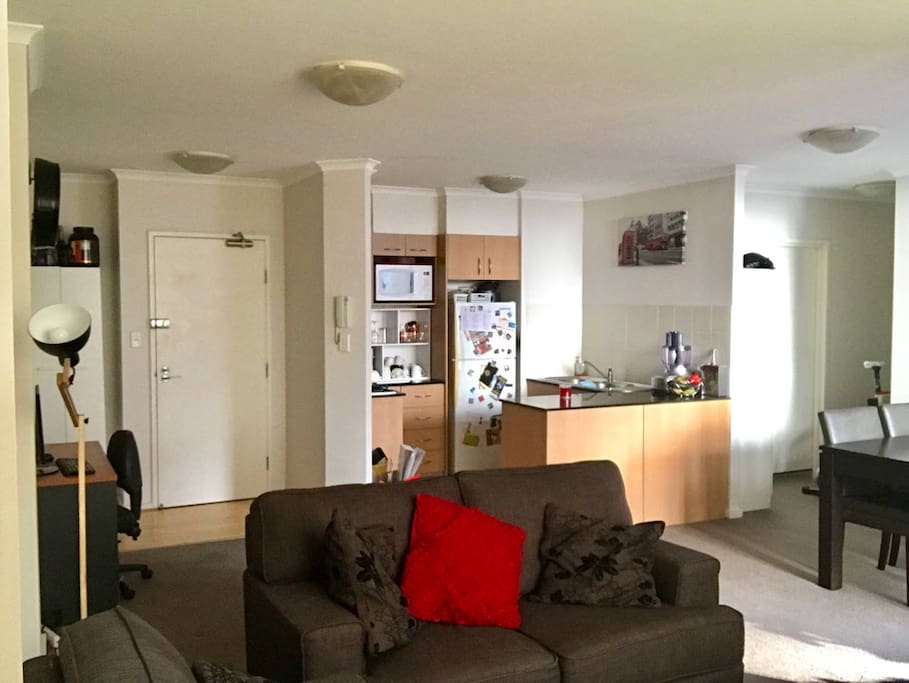 Spacious living room, with Foxtel TV