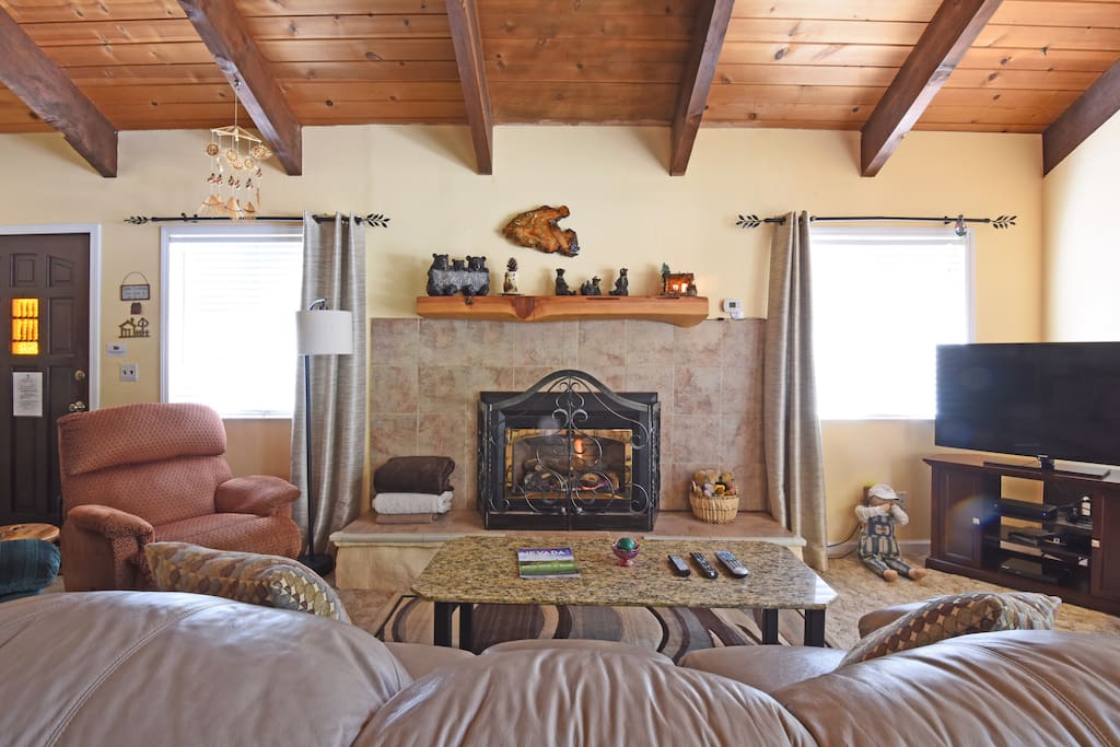 Living room with gas fireplace and flat screen TV