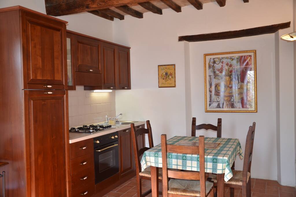 The kitchen area of the smaller apartment.