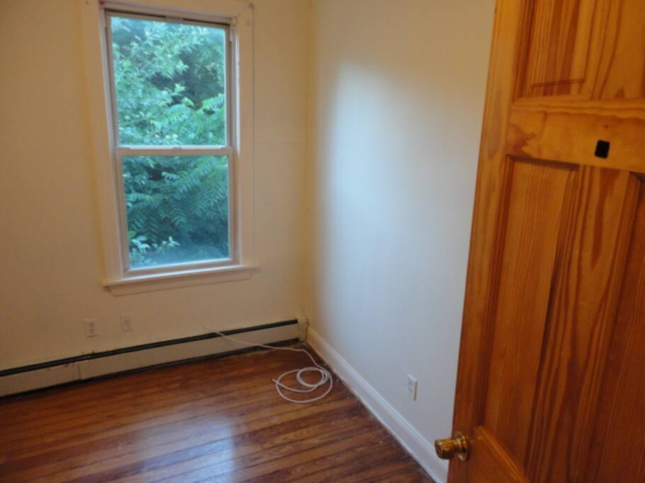 Great view of trees in bedrooms. These are photos without the beds