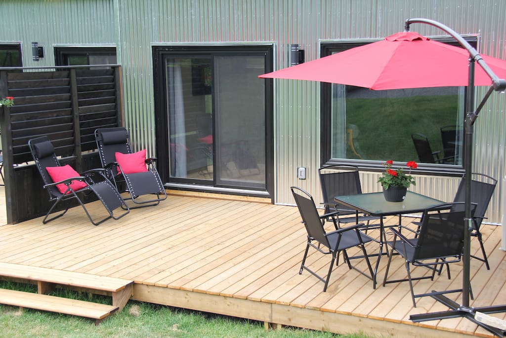 Chill Patio with lovely green space surrounding