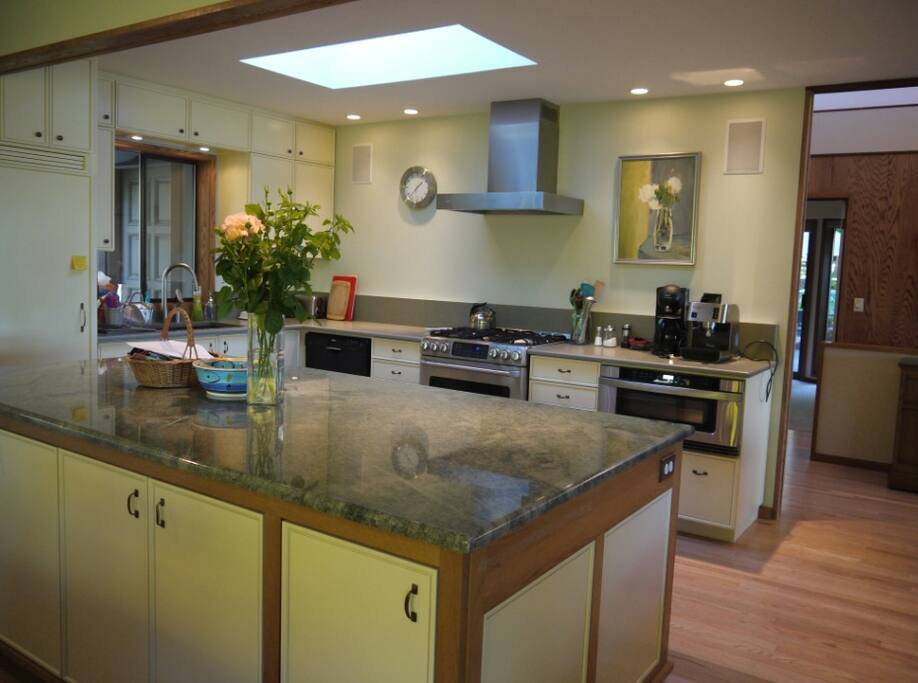 New Kitchen with dining table and large island.