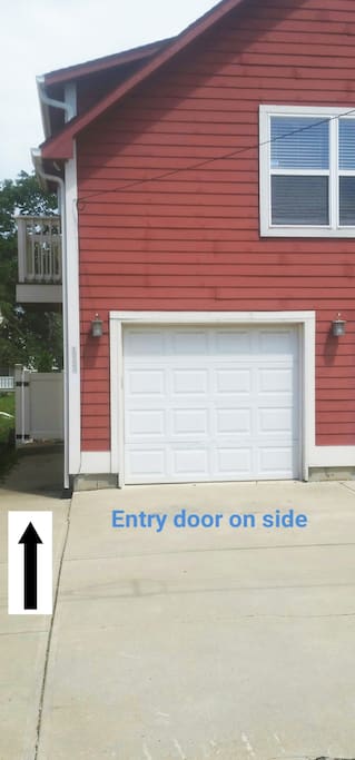 outdoor 1 car parking space and sidewalk to front door