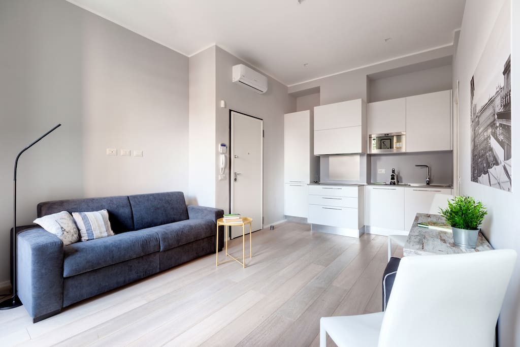 The main entrance | The Living room & The equipped Kitchen
