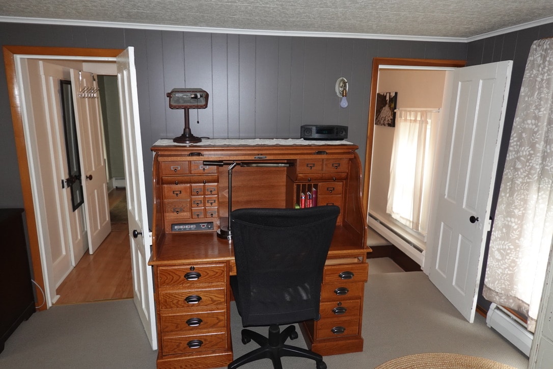 Roll-top desk and Bose cd player at Cozy House in Ridgway