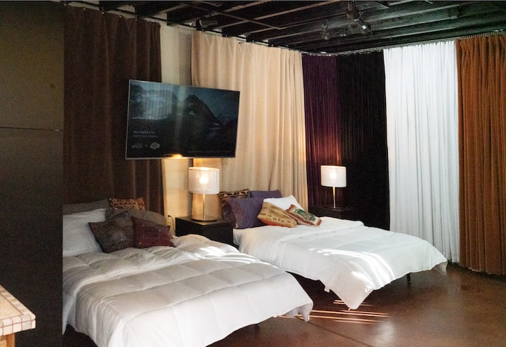 2 Full size futons with TV and soundproof black out curtains 