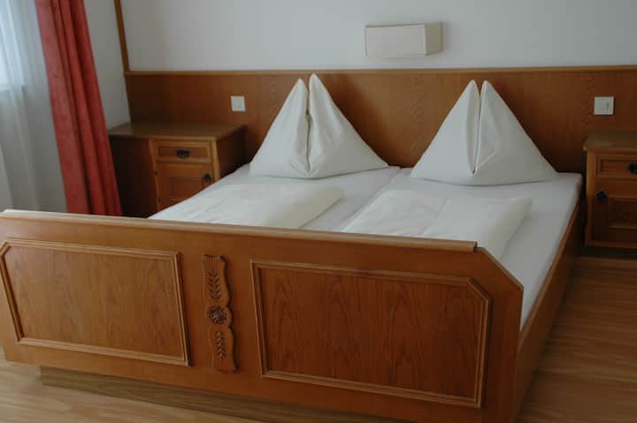 Comfortable room with a double bed (sheets included)