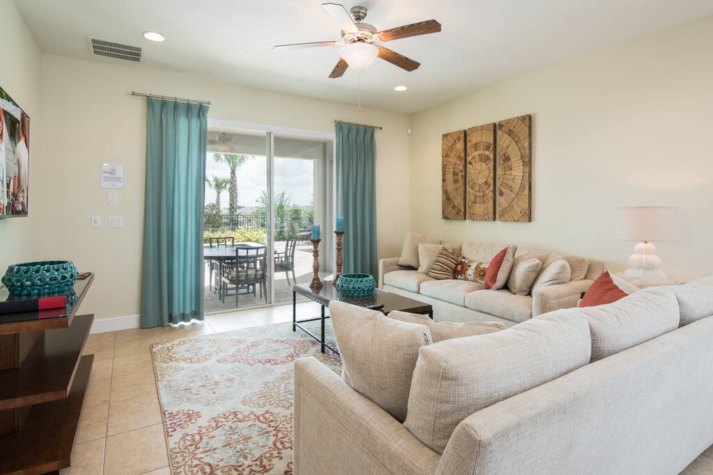 Living Room and Sliding Doors to the Lanai and Pool Area