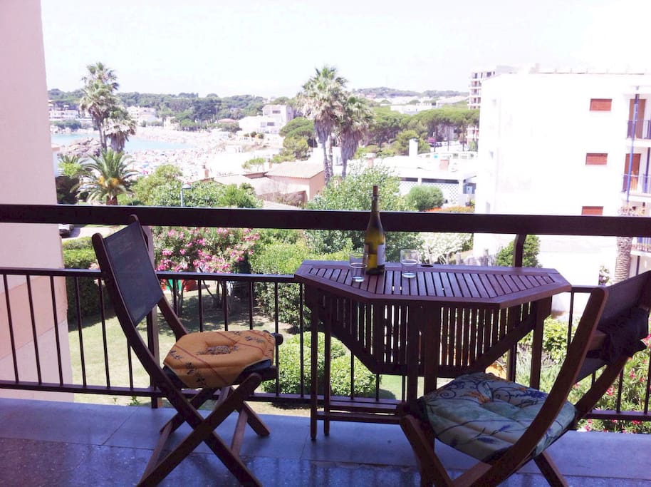 Large balcony with stunning views of the beach, sun rise and sets.