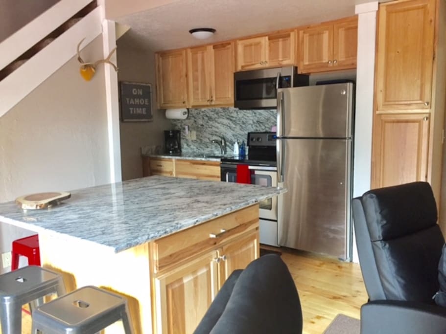 Brand new kitchen. Granite countertops with huge island that seats 8 for meals and conversation! Large screen TV for watching a game or winding down.