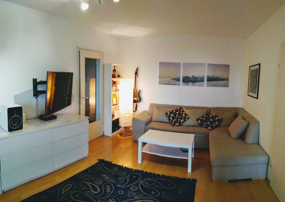 Spacious living room with 50" 4K TV