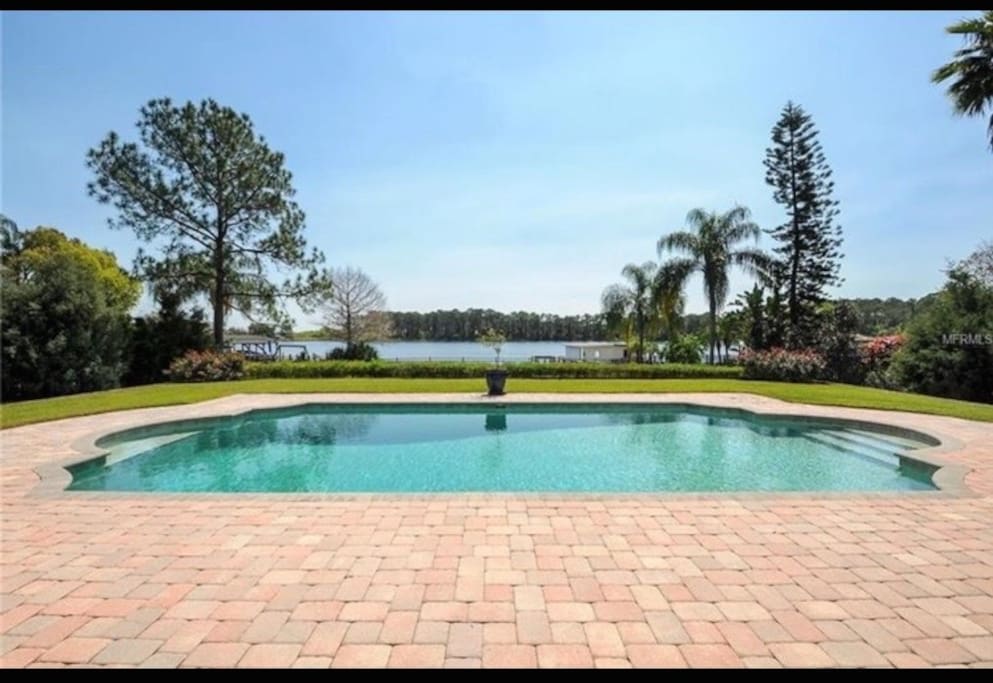 Overlooking the lake is a beautiful pool to enjoy when you need a break from the Florida heat!