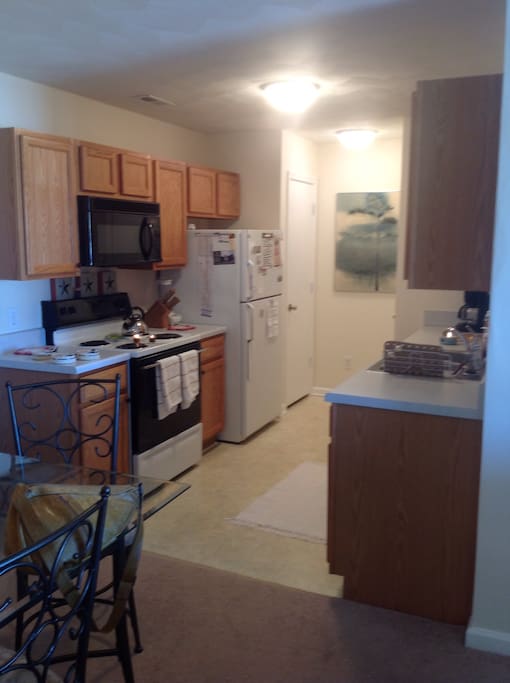Kitchen is fully equipped for your every need. From toaster ovens to microwave, stove, blender,pots and pans, dishes, coffee maker, and even a dishwasher.