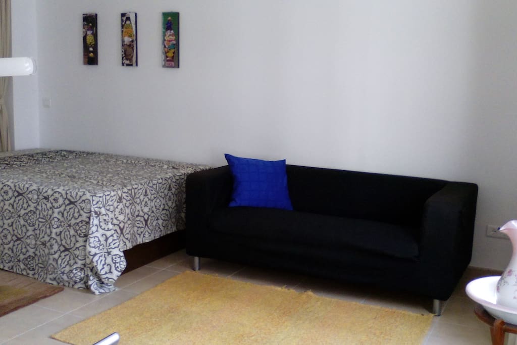 second bed in living area (with curtain to separate)