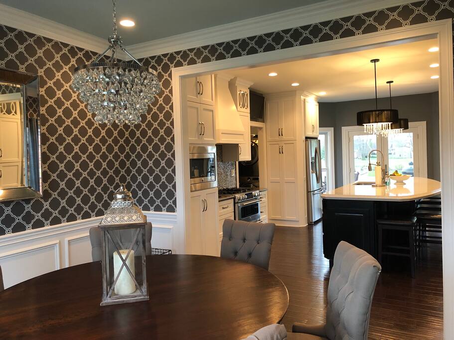 Dining room table seats 6 and is open to kitchen