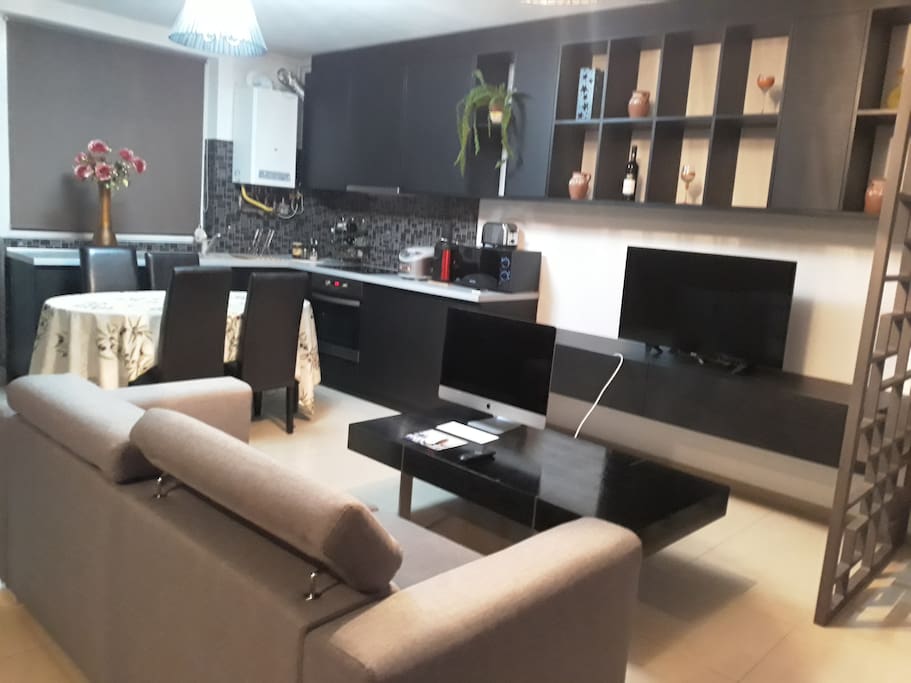 The living room and dining kitchen