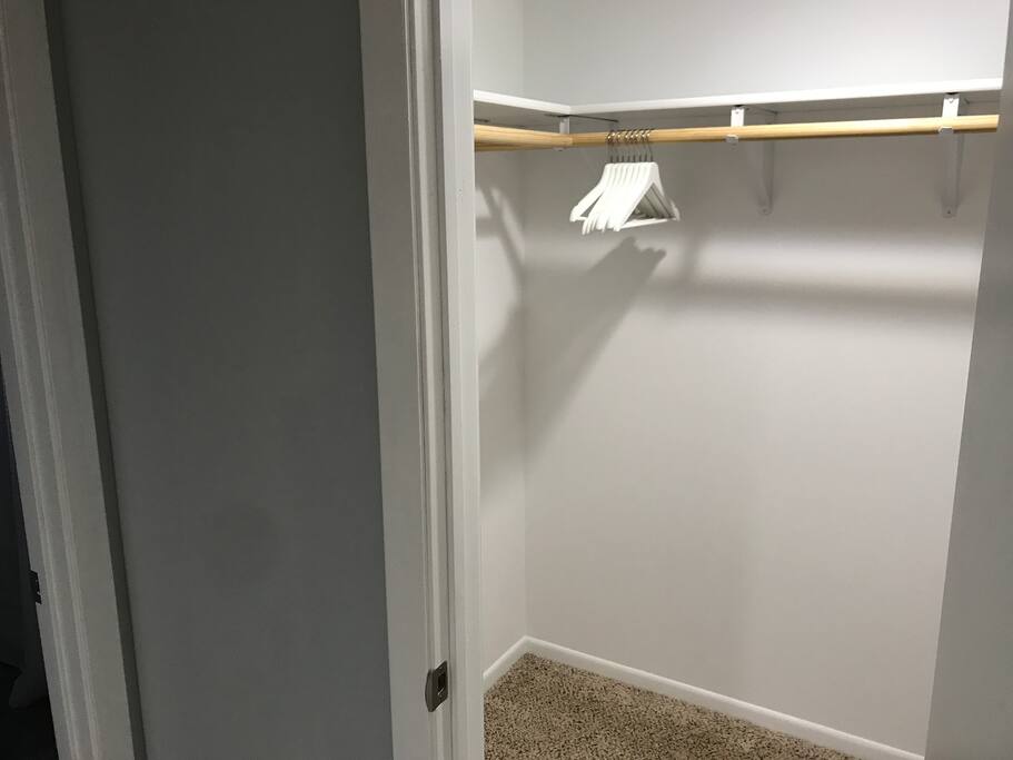 Walk in closet for storing luggage