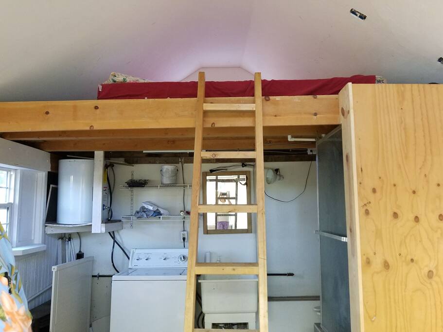 Washing machine available. Loft above with window and room for personal items.