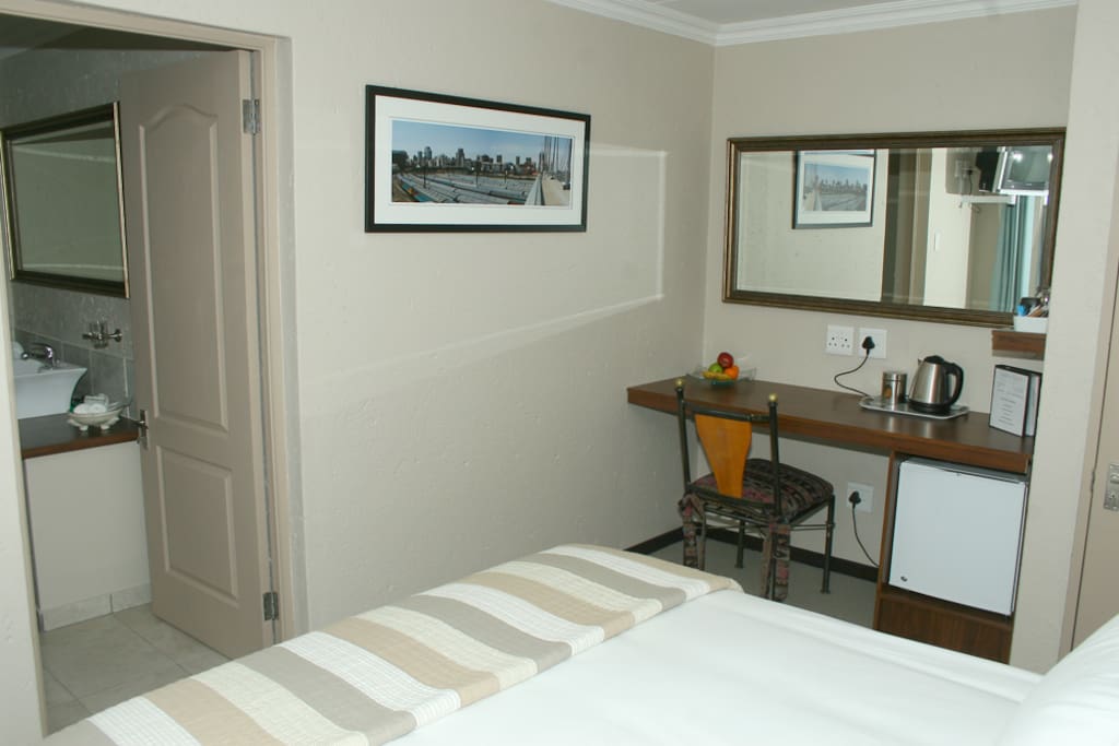 Room 1 Desk, fridge and desk