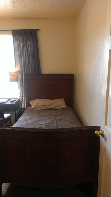 Rented bedroom: Twin bed, circa 1930s