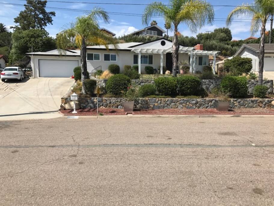 Parking directly behind garage, street, of on the side (but close to garage)