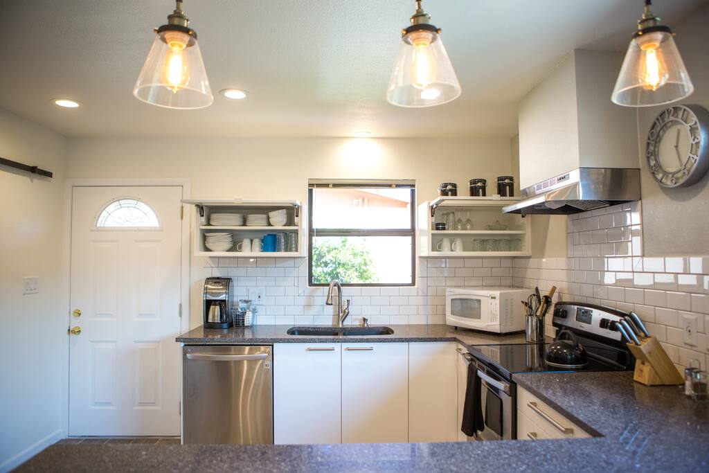 Our roomy kitchen is fully equipped for your convenience.