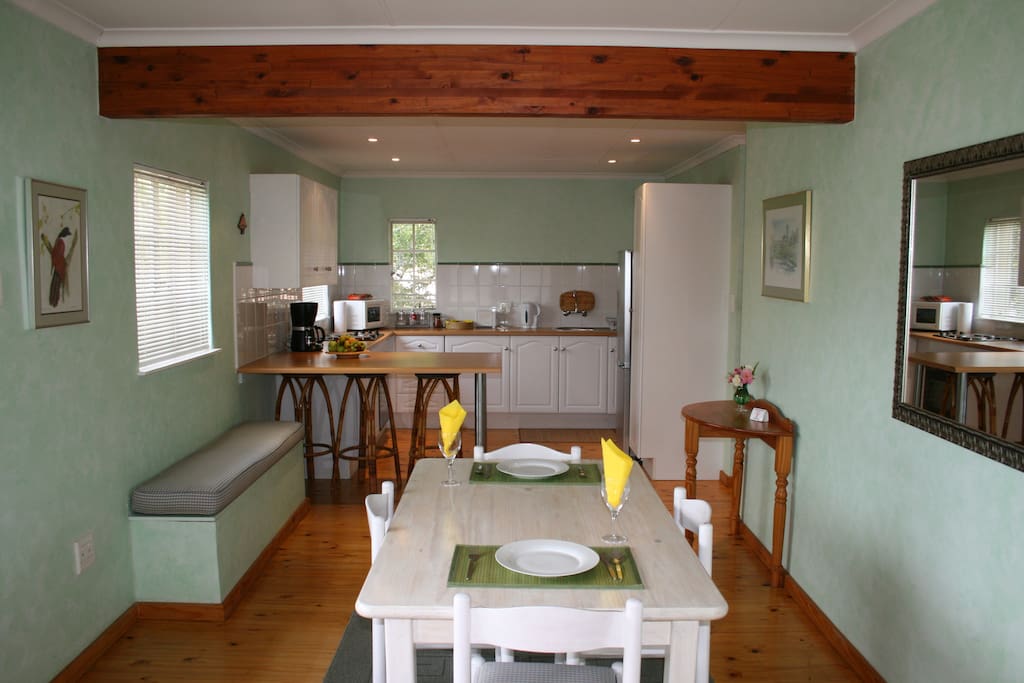 Kitchen dining area with full complete kitchen.