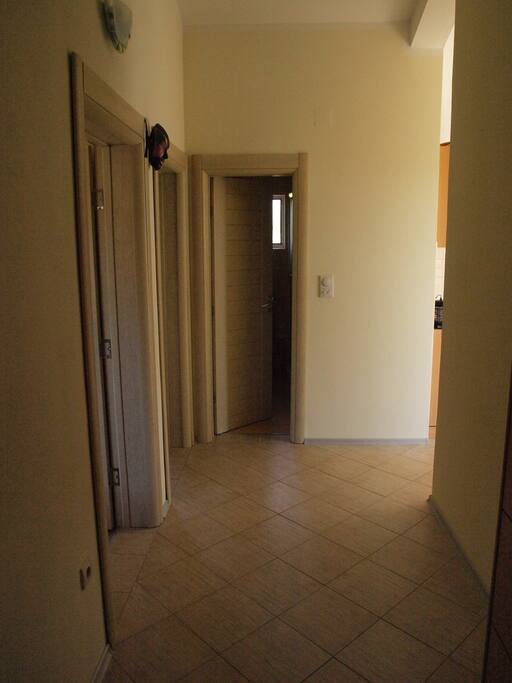 entrance (The left side two bedrooms, the right side kitchen and balcony and the straight is bathroom)