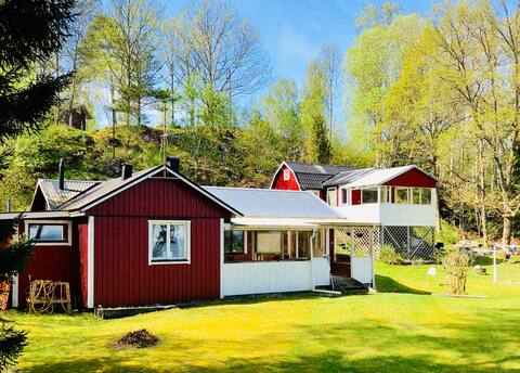 Two lovely cabins by the lake with private beach