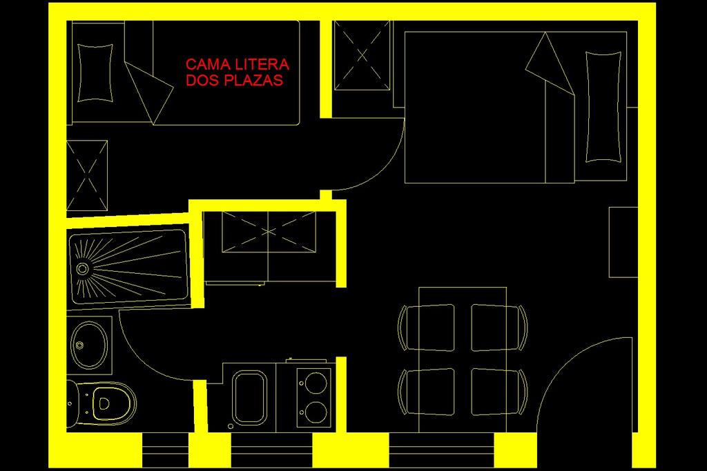 Plano de la vivienda. Sofá-cama abierto en salón