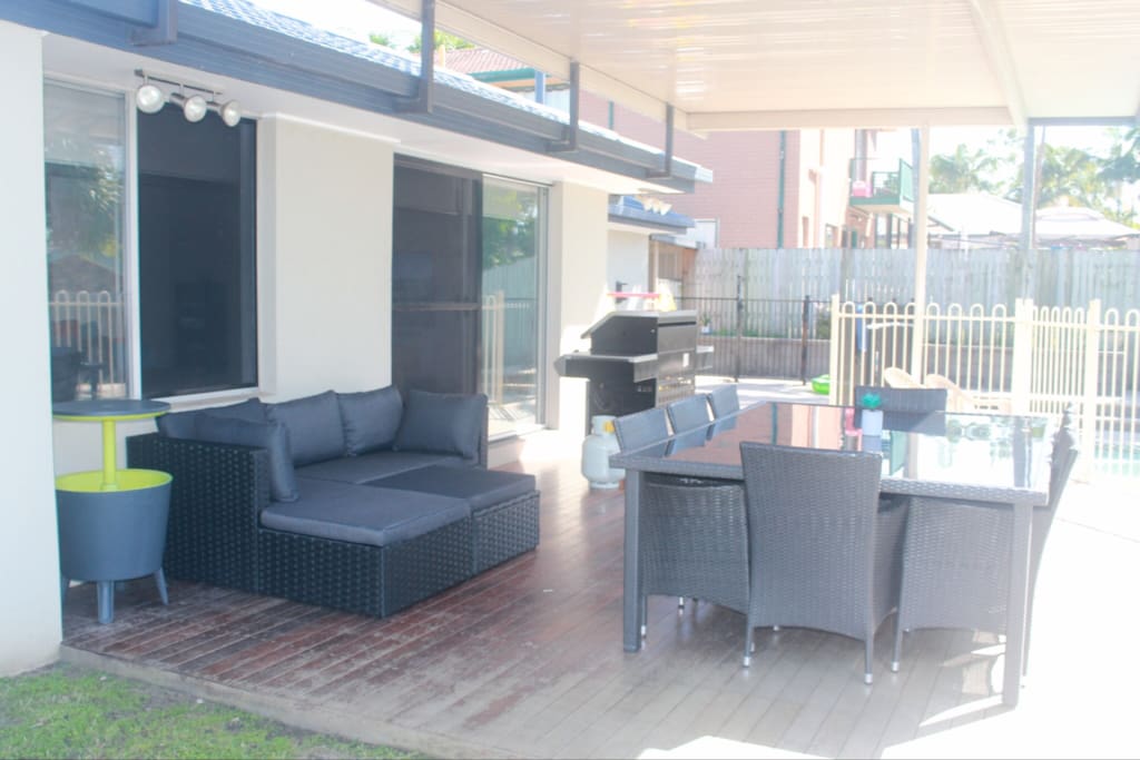 Out door BBQ and Entertaining Area on Back Patio Overlooking Pool