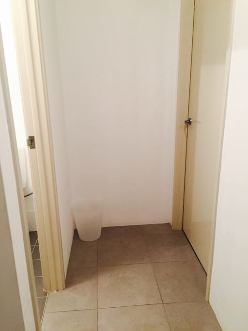 Private toilet on left; bedroom on right