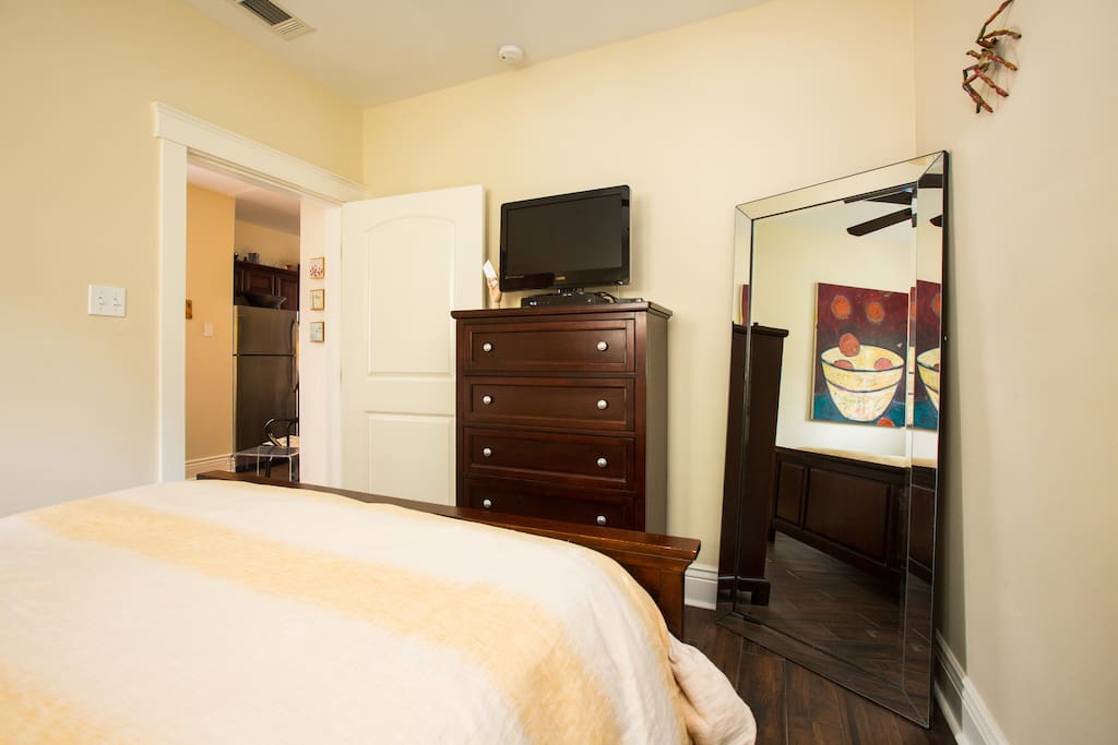 Oversized mirror in bedroom