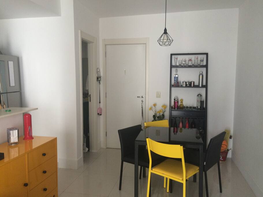 Entrance, dinning table and bar