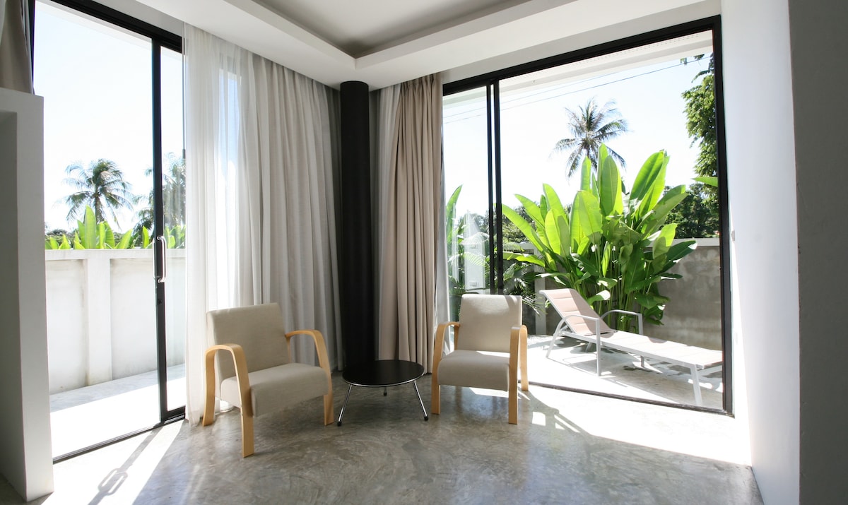 View from living room to private terrace Breeze apartment