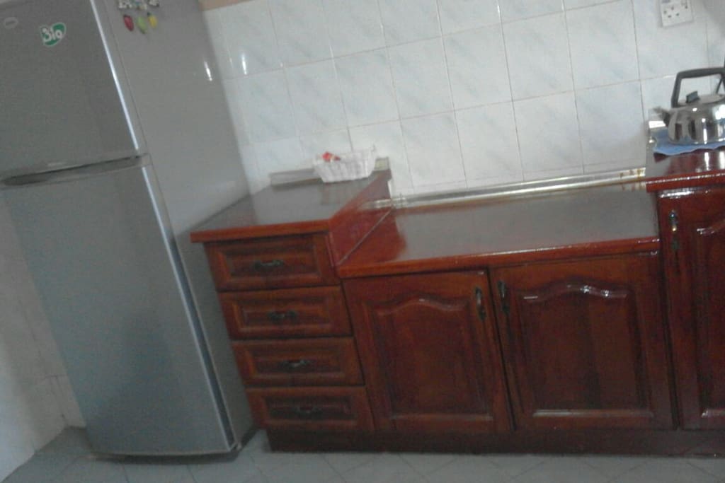 Refrigerator and Cabinet