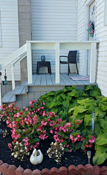 Guest Cottage Entrance: Secluded garden along your private entrance to your apartment (facing away from street) facing the main Lakeside Methodist church.