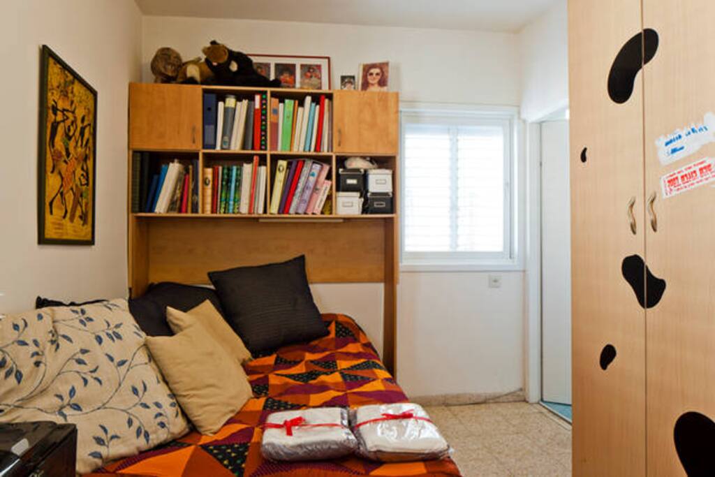 This is your cool room with a cabinet and a desk.