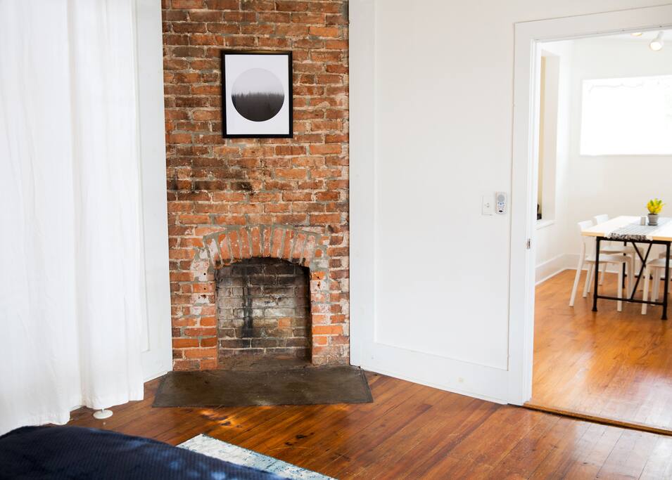 Decorative fireplace in master- one of The Yellow Door's many charming details.