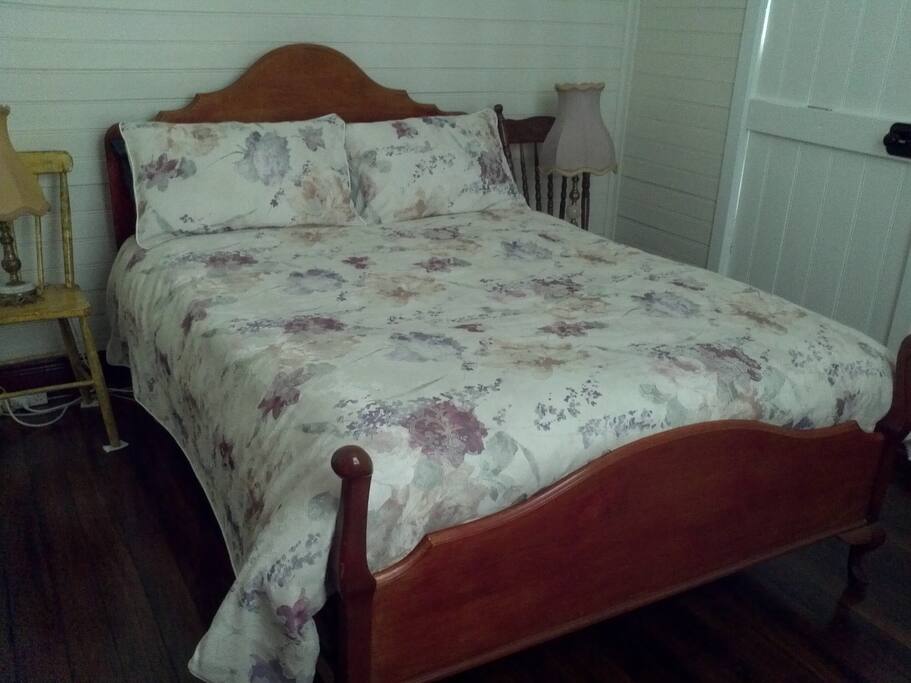 Period furnishings and original polished hardwood floors.