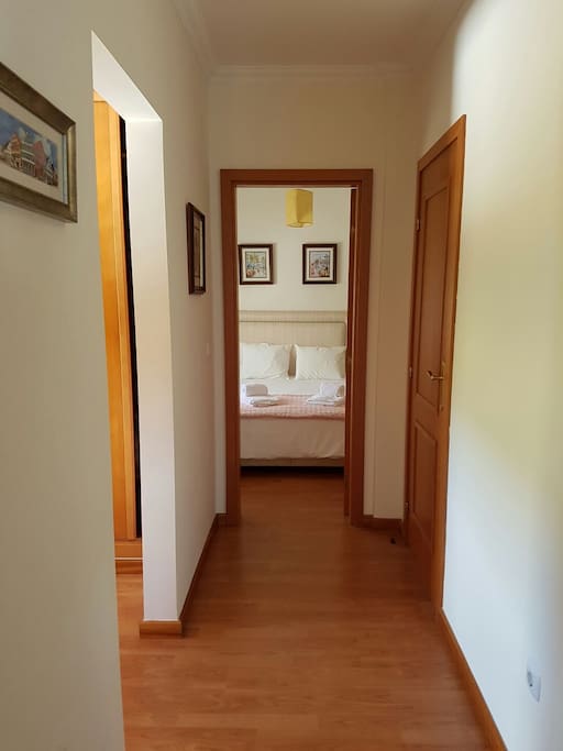 Corridor between 2 rooms and closet in the middle