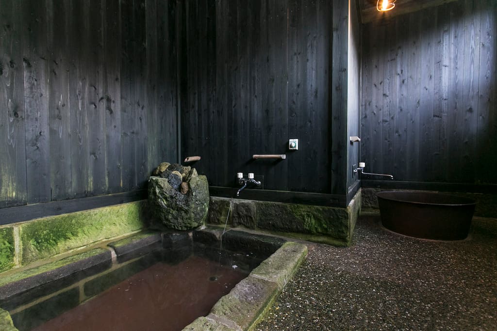 On the left, there is a normal bath tub. And on the right, we have a 'Goemonburo' (Cauldron Bath), which is a bath tub shaped like a cauldron based on the Legend of Goemon, who was executed by being boiled alive in a cauldron. Of course, we will adjust the temperature so it is an enjoyment for you :)